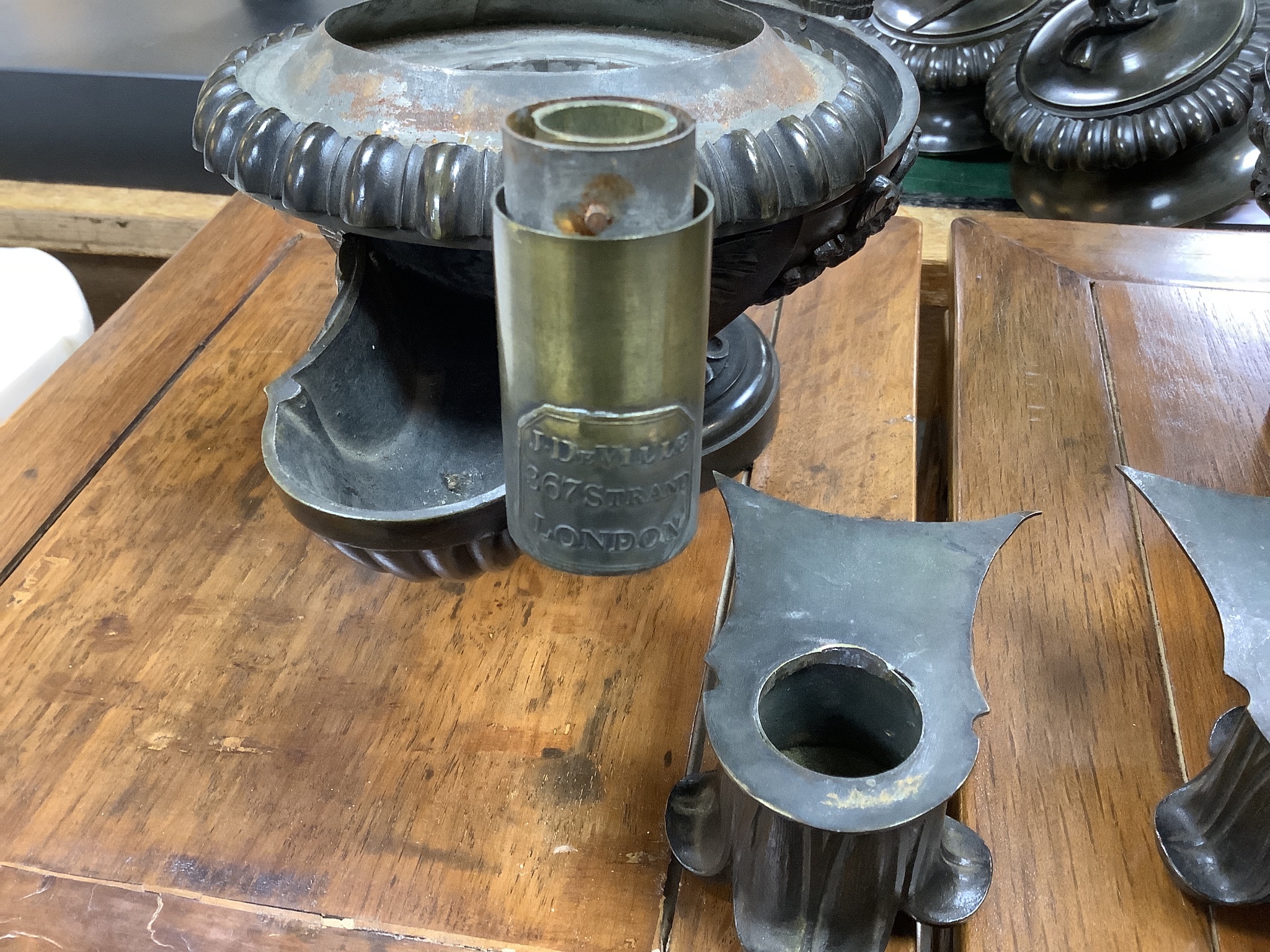 James De Ville, 367 Strand, London. A pair of Regency bronze oil lamps to a design by Thomas Hope, length 31cm depth 16cm height 25cm